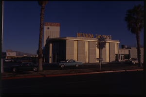 Color view of the Nevada Savings building, located at the South East corner of Charleston Boulevard and Maryland Parkway. The Huntridge Theater is visible in the background.