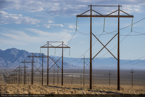 Transmission lines connect power produced at Crescent Dunes Solar to the Nevada grid, near Tonopah, Nevada: digital photograph