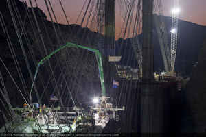 Photograph of the final concrete pour forming the keystone of the arch for the Mike O'Callaghan-Pat Tillman Memorial Bridge between Nevada and Arizona, August 10, 2009