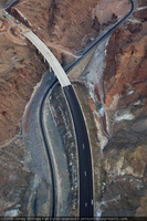 Photograph showing an aerial view of the Hoover Dam bypass highway intersecting with the original road leading to the dam, Arizona border, September 10, 2009
