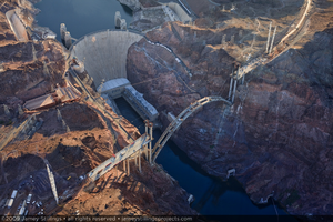 Photograph showing an aerial view of the Mike O'Callaghan-Pat Tillman Memorial Bridge, Hoover Dam, Colorado River, and Lake Mead, September 10, 2009