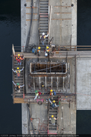 Photograph of the evening shift of ironworkers heading to work on the Nevada side of the Mike O'Callaghan-Pat Tillman Memorial Bridge, October 20, 2009