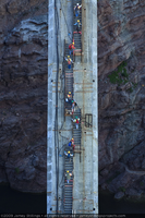 Photograph of ten ironworkers heading to work on the Nevada side of the Mike O'Callaghan-Pat Tillman Memorial Bridge, October 20, 2009