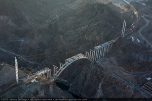 Photograph showing an aerial view of the twelve central girders installed to support the Mike O'Callaghan-Pat Tillman Memorial Bridge deck, Nevada-Arizona border, February 3, 2010
