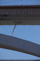Photograph of a ladder extending from the arch of the Mike O'Callaghan-Pat Tillman Memorial Bridge to a walkway during construction, Nevada-Arizona border, April 13, 2010