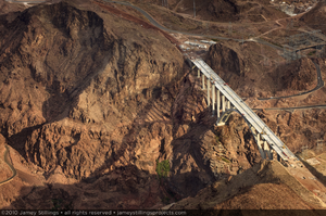 Photograph showing an aerial view of the Mike O'Callaghan-Pat Tillman Memorial Bridge under construction, Nevada-Arizona border, July 31, 2010