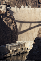 Photograph of a shadow from the Mike O'Callaghan-Pat Tillman Memorial Bridge cast onto the face of Hoover Dam, January 12, 2011