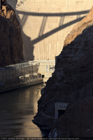Photograph of a shadow from the Mike O'Callaghan-Pat Tillman Memorial Bridge cast onto the face of Hoover Dam, January 12, 2011