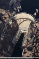 Photograph showing an aerial view of the Mike O'Callaghan-Pat Tillman Memorial Bridge casting a shadow over the face of Hoover Dam, Nevada-Arizona border, January 14, 2011