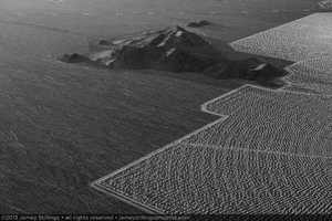 Photograph of heliostats of Units 3 and 2 circumventing the hills to the east of Ivanpah Solar, March 21, 2013