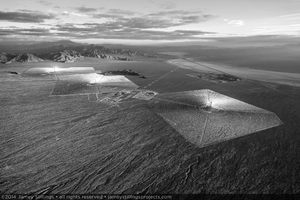 Photograph of Ivanpah Solar looking to the northeast at sunrise with Primm Valley Golf Course, February 3, 2014