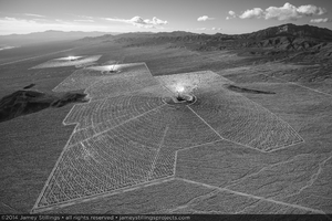 Photograph of Ivanpah Solar looking south with the plant producing electricity from all three towers, February 3, 2014