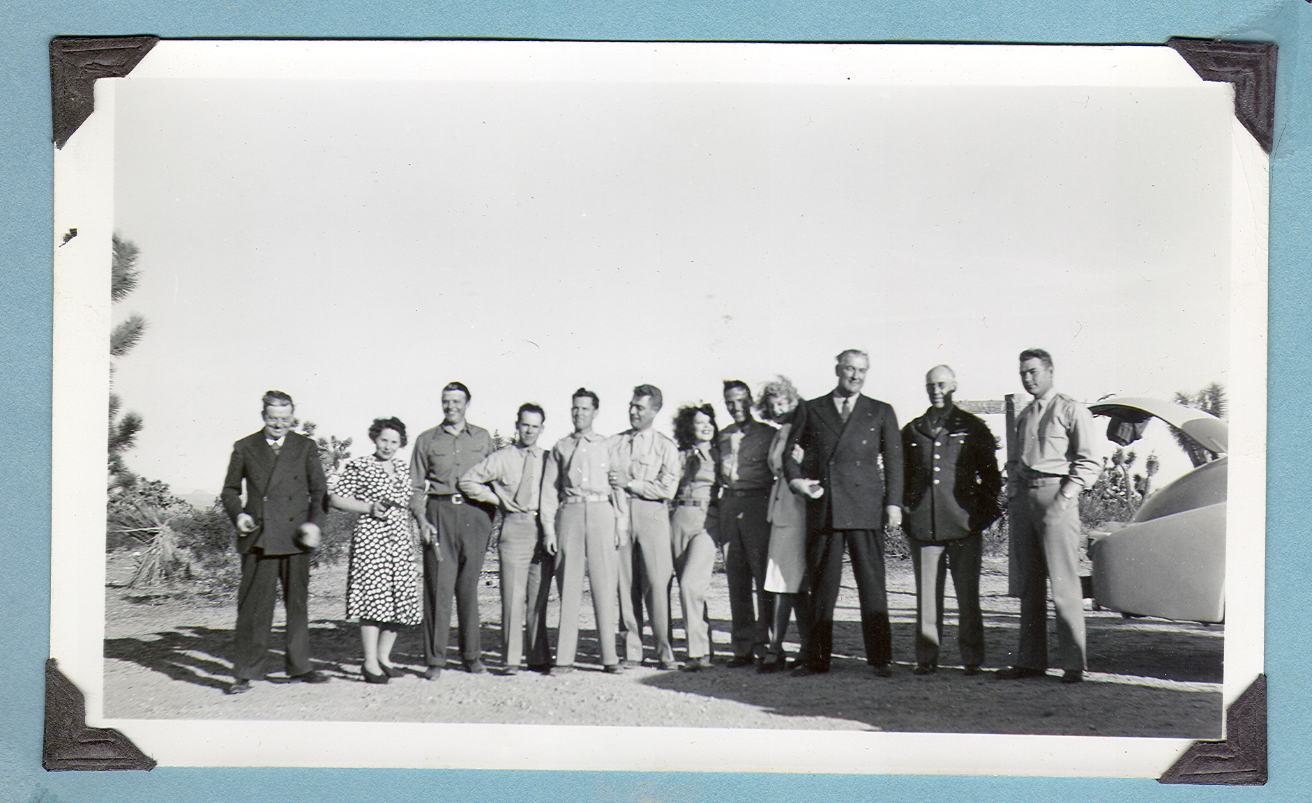 Group photo of twelve people at the ranch. Looks like Clara and Rex in the middle: photographic print