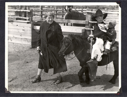 Daisy Beldam, George Beldam Jr. and Rex Bell Jr. with a pony at Walking Box Ranch, Nevada: photographic print