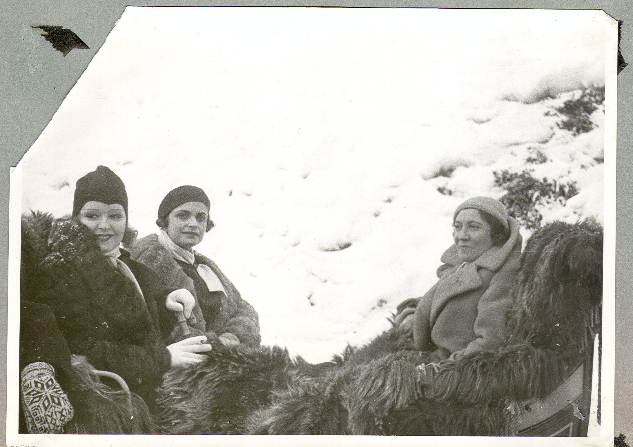 Clara Bow Bell in sleigh with two unidentified women during her honeymoon in Europe: photographic print