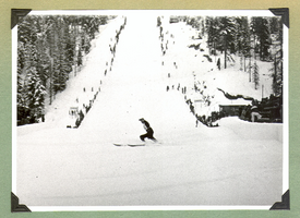 Unidentified skier at the bottom of ski run in Europe: photographic print