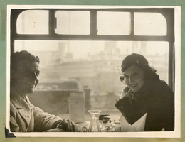 Rex Bell and Clara Bow Bell at a restaurant during their honeymoon in Europe: photographic print