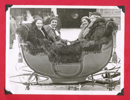 Clara Bow Bell (left) and three other unidentified women in a sleigh in Europe during her honeymoon: photographic print