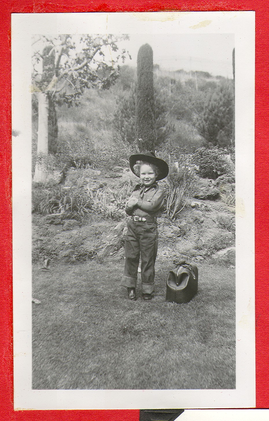 Rex Bell Jr. posing in a cowboy hat: photographic print