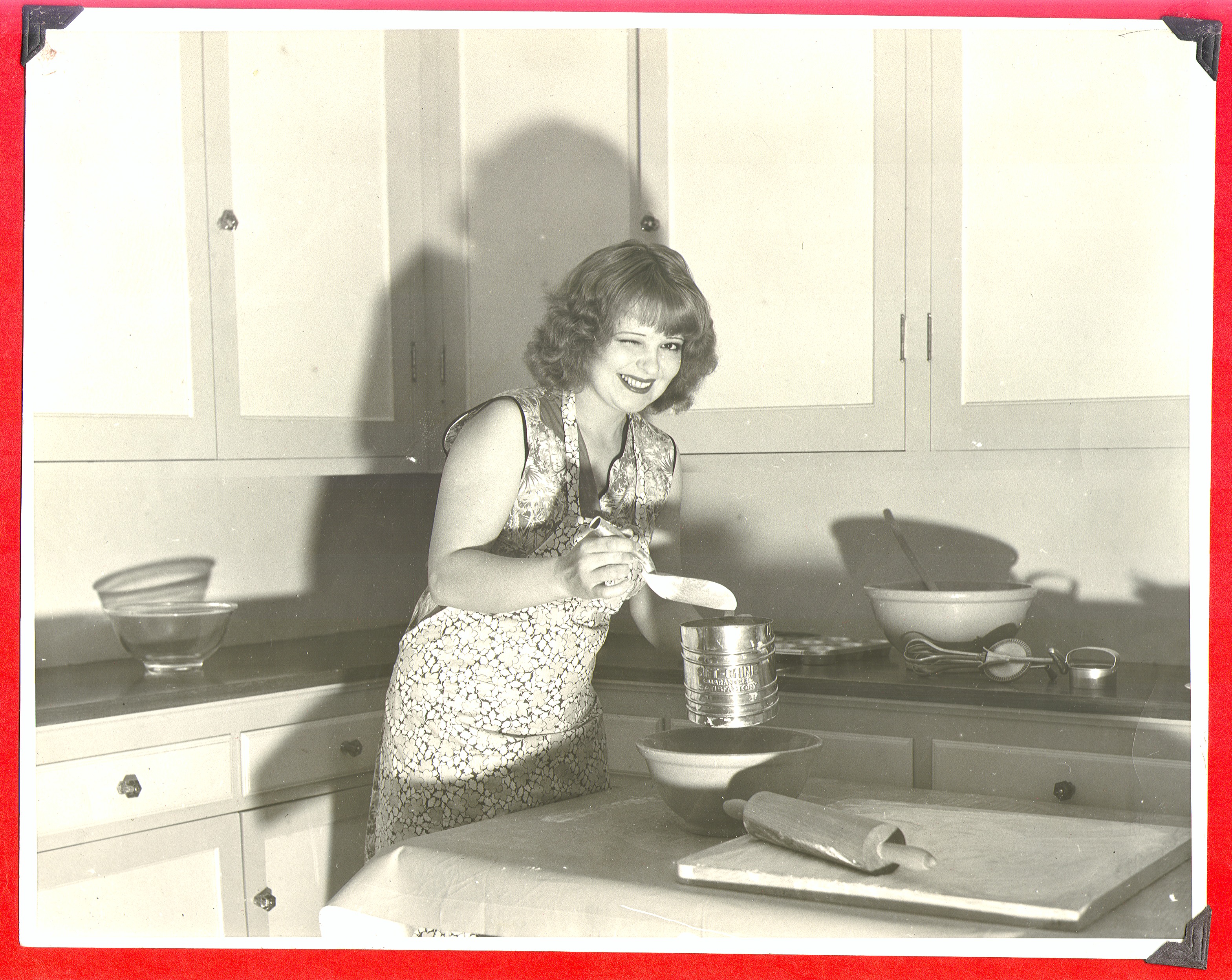 Clara Bow Bell baking in the ranch kitchen: photographic print