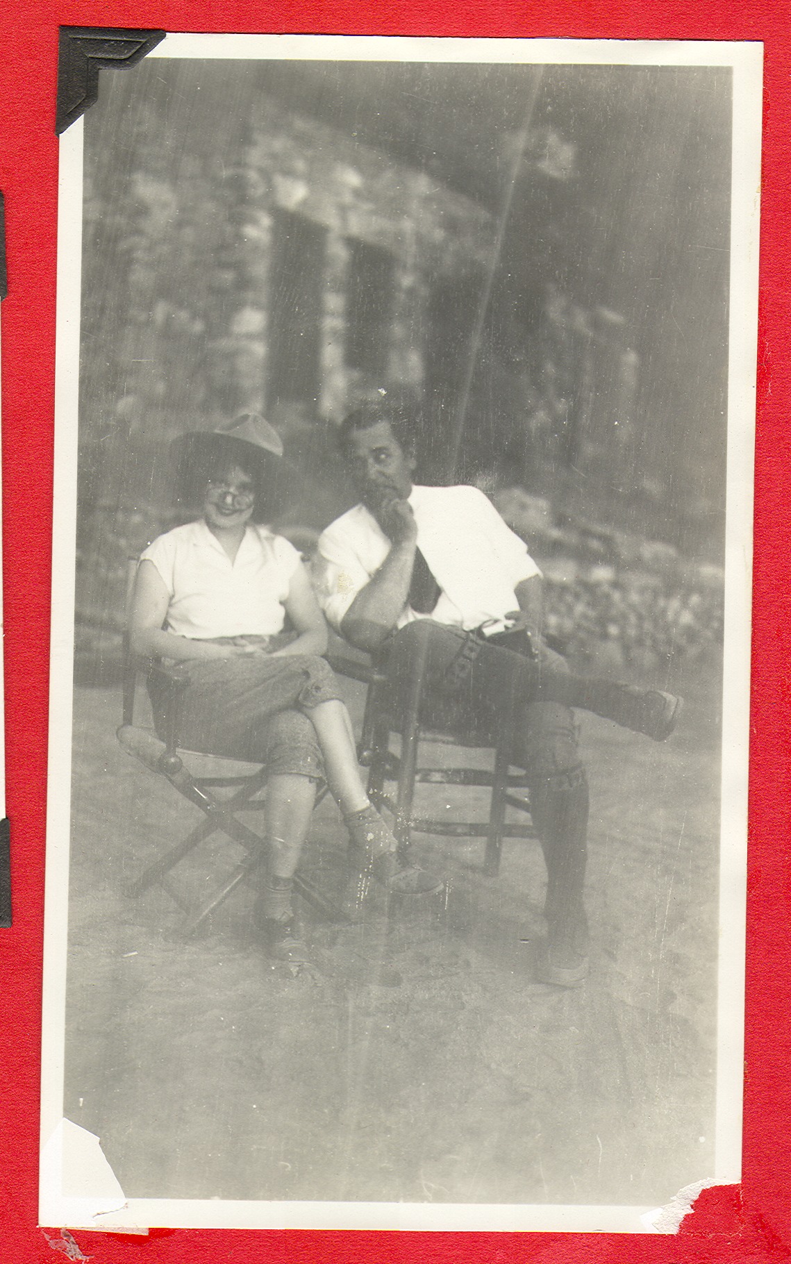 Clara Bow Bell and man seated: photographic print