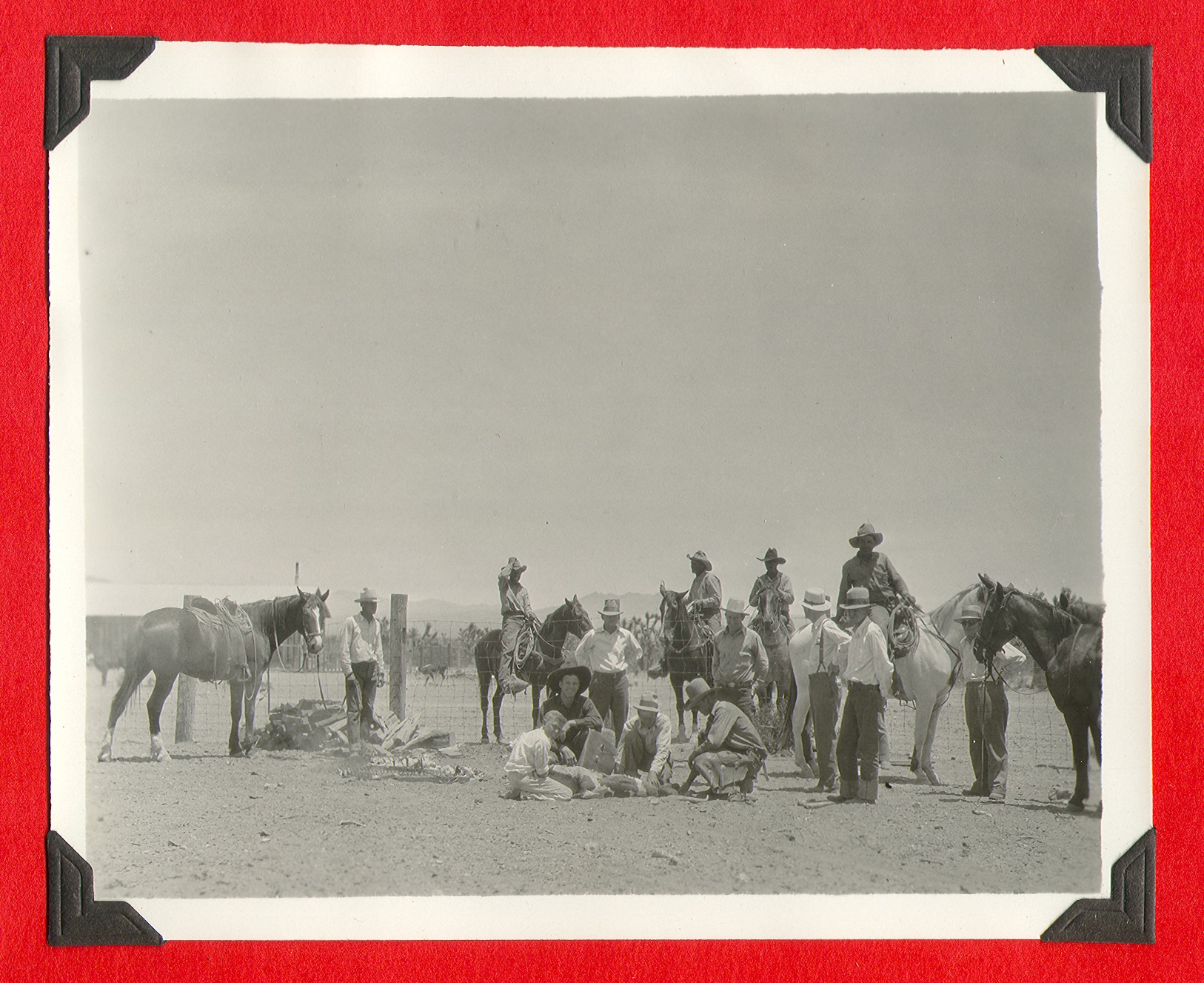 Group photo of George Francis Beldam with men and horses on the ranch: photographic print
