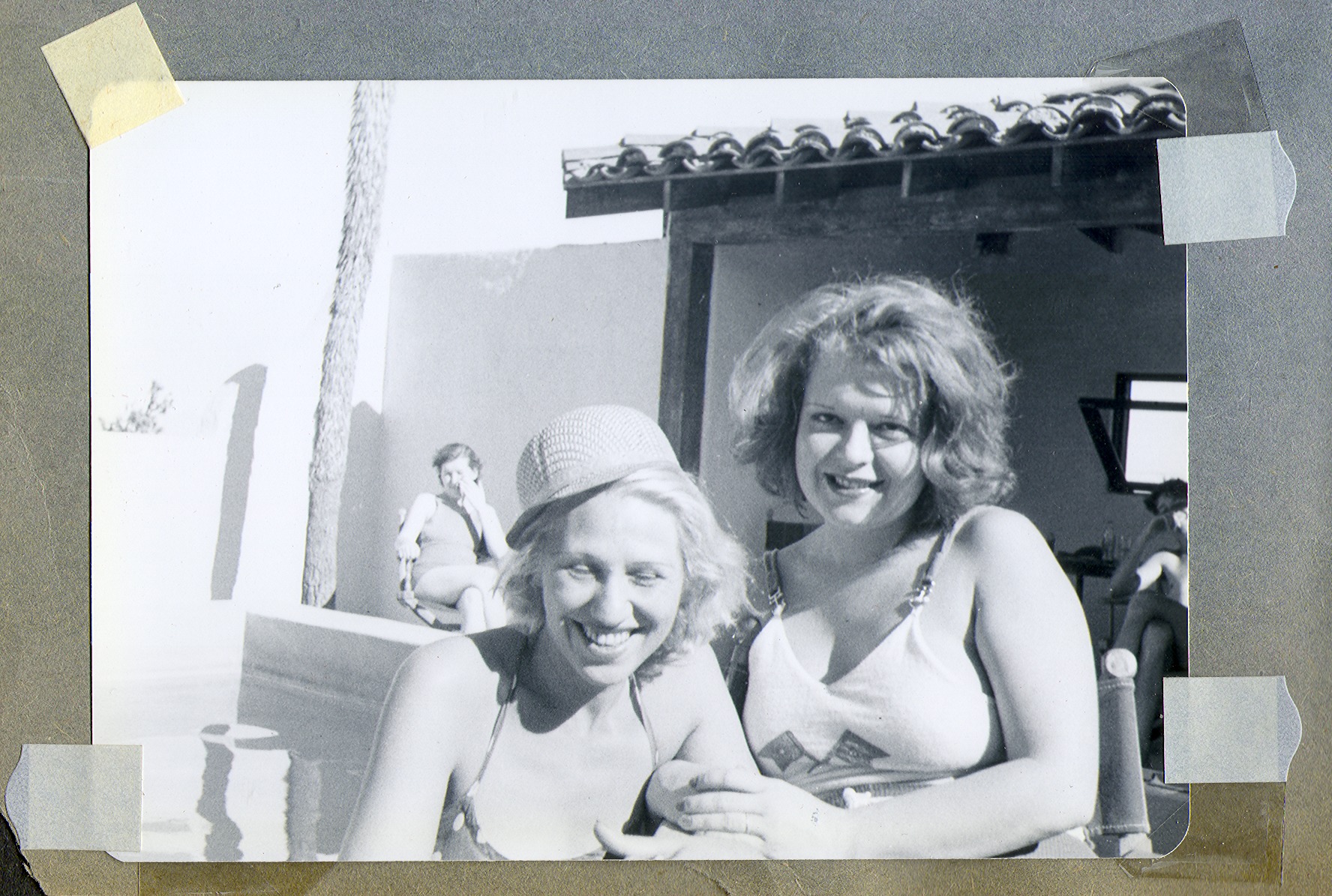Clara and Carmen Schmidt in bathing suits by the pool: photographic print