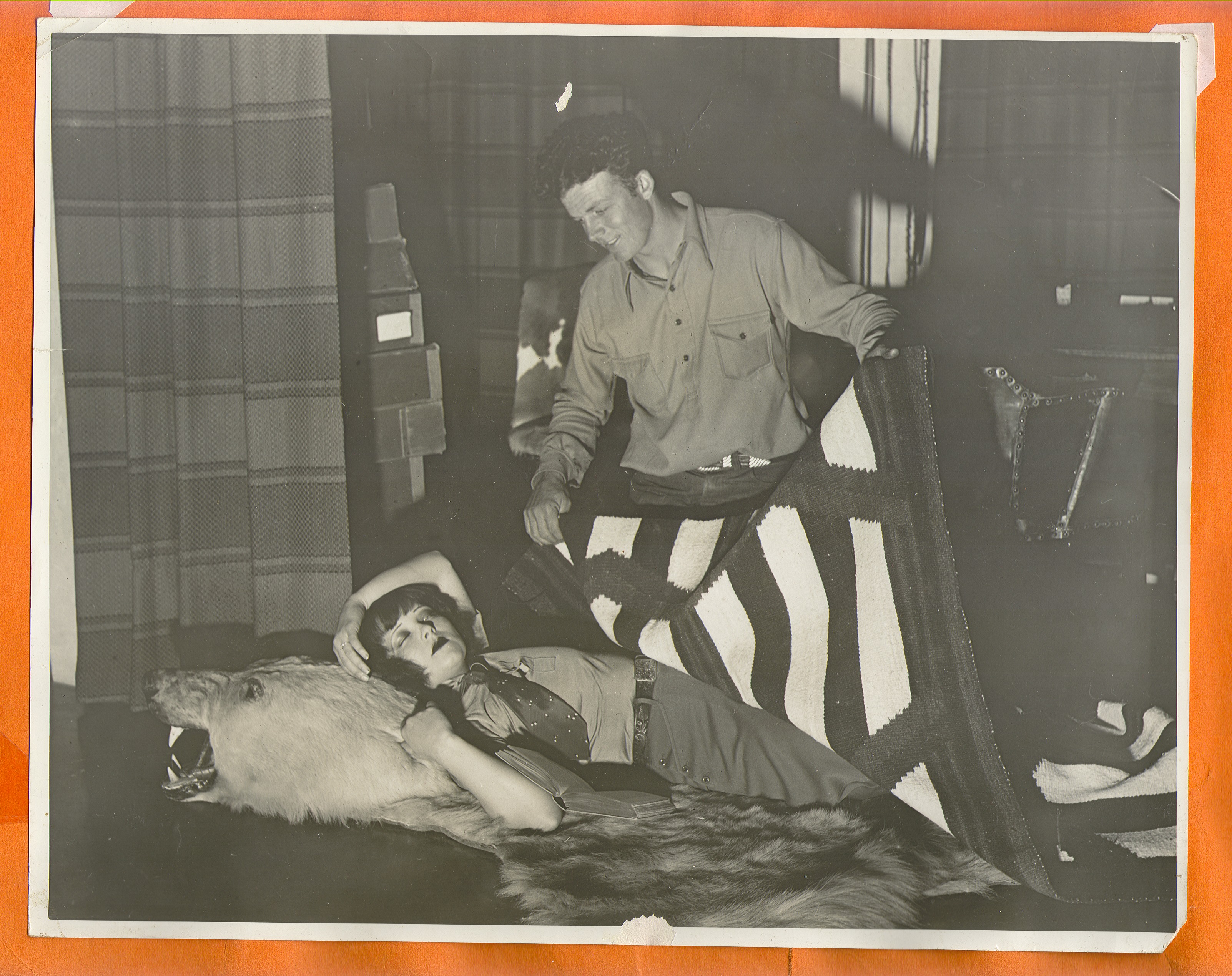 Clara Bow Bell and Rex Bell in what appears to be a movie scene: photographic print