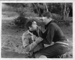Rex Bell and Bud Osborne in a movie still from "Diamond Trail": photographic print