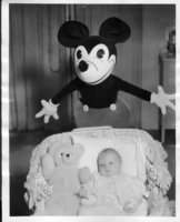 Rex Anthony Bell, Jr (Toni Larbow Beldam) as an infant with a Mickey Mouse stuffed toy