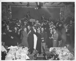 Group of military people and other unidentified people at a dance