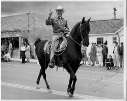 Rex Bell (George Francis Beldam) on horseback in a parade