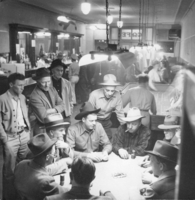 Rex Bell (George Francis Beldam) playing poker with some unidentified men
