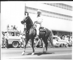 Rex Bell (George Francis Beldam) on horseback in a parade