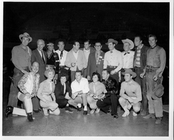 Rex Bell (George Francis Beldam) with the cast of Rawhide. Stamped on back: Las Vegas News Bureau, Las Vegas, Nev. - P.O. Box 28,  Photographers Don English, Joe Buck, Jerry Abbott, Milt Palmer