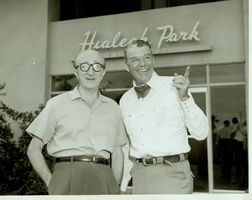 Rex Bell (George Francis Beldam) (left) with man at unknown location. Handwritten on back: Herman D. Kenin, President AF of Musicians. June, 1960