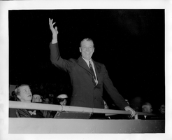 Rex Bell (George Francis Beldam) at the Cow Palace in 1956. Handwritten on back: Cow Palace 1956. Stamped on the back: Compliments of Lieutenant Governor, Harold J. Powers, Sacramento, California