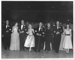 Rex Bell (George Francis Beldam) (third from left) and other unidentifed people at a formal event. Stamped on back: Fendrich Studio, Box 360, Carson City, NV  Phone 109W
