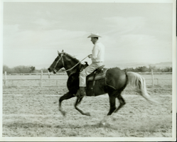 Rex Bell (George Francis Beldam) on horseback at unknown location.  Horse's name is Buddy