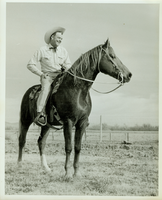 Rex Bell (George Francis Beldam) on horseback at unknown location.  Horse's name is Buddy