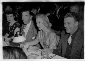 Photograph with Rex Bell (George Francis Beldam) (right) and other unidentified people at a dinner event at an unknown location