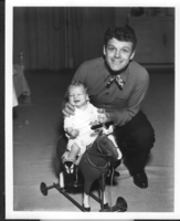 Photo of Rex Bell (George Francis Beldam) with Rex Anthony Bell, Jr (Toni Larbow Beldam) as an infant