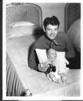 Photo of Rex Bell (George Francis Beldam) with Rex Anthony Bell, Jr (Toni Larbow Beldam) as an infant