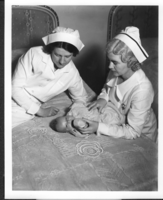 Photo of Rex Anthony Bell, Jr (Toni Larbow Beldam) as an infant with two unidentified nurses