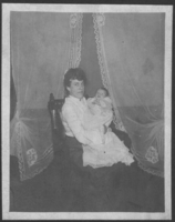Rex Bell (George Francis Beldam) and his Mother.  Rex was six weeks old.  Born on 10/16/1903.  Photo taken at 5617 Mich. Ave. Chicago. Handwritten on back: George Francis Beldam & Mother alias "Dooley" at six weeks. Born Oct 16th, 1903.  Taken at 5617 Mich. Ave. Chicago