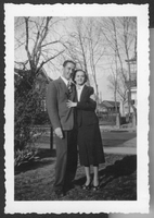 Picture of unknown couple in 1938. Handwritten text on back is unreadable except for the date: 1938