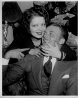 Rex Bell (George Francis Beldam) and Clara Bow.  Clara's "It" statue is sitting behind her shoulder