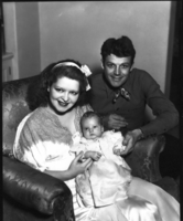 Photograph of Clara Bow and Rex Bell (George Francis Beldam) with their new infant Rex Anthony Bell, Jr (Toni Larbow Beldam)