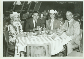 Katie Jenkins, Glen Ford, unknown, Rex Bell (George Francis Beldam) (From left to right) sitting at a table: photographic print 