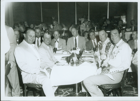 Rex Bell with a group of unidentified men in Reno, Nevada: photographic print